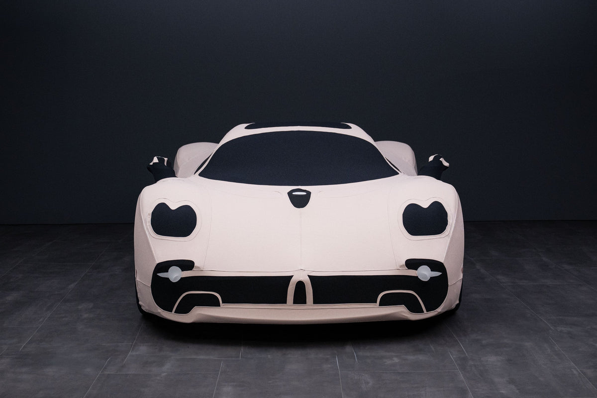 Front view of the Pagani Utopia Roadster beneath its bespoke Goodwool cover